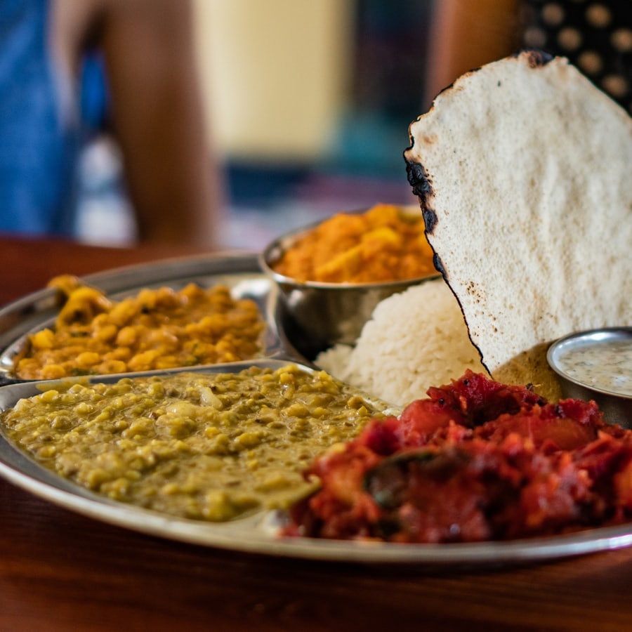 Bengali curry served with rice and naan
